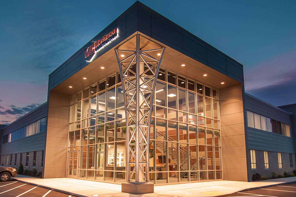 Evening view of the Methuen Construction main entrance and lobby