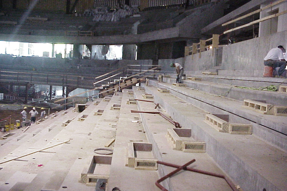 The extensive slab work had to integrate seamlessly with the pre-cast seating sections