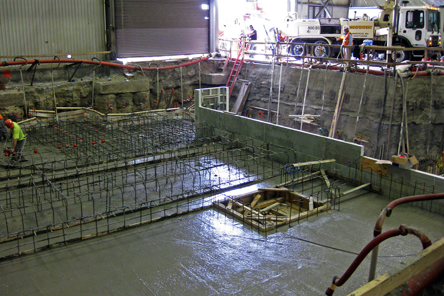 The 4 foot thick slab required a unique foundation system to support the extreme weight of the slab