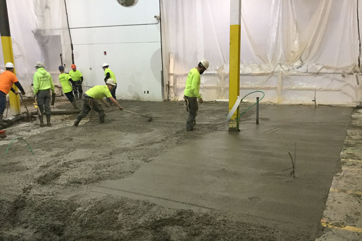 Concrete placement for the floor of the new building