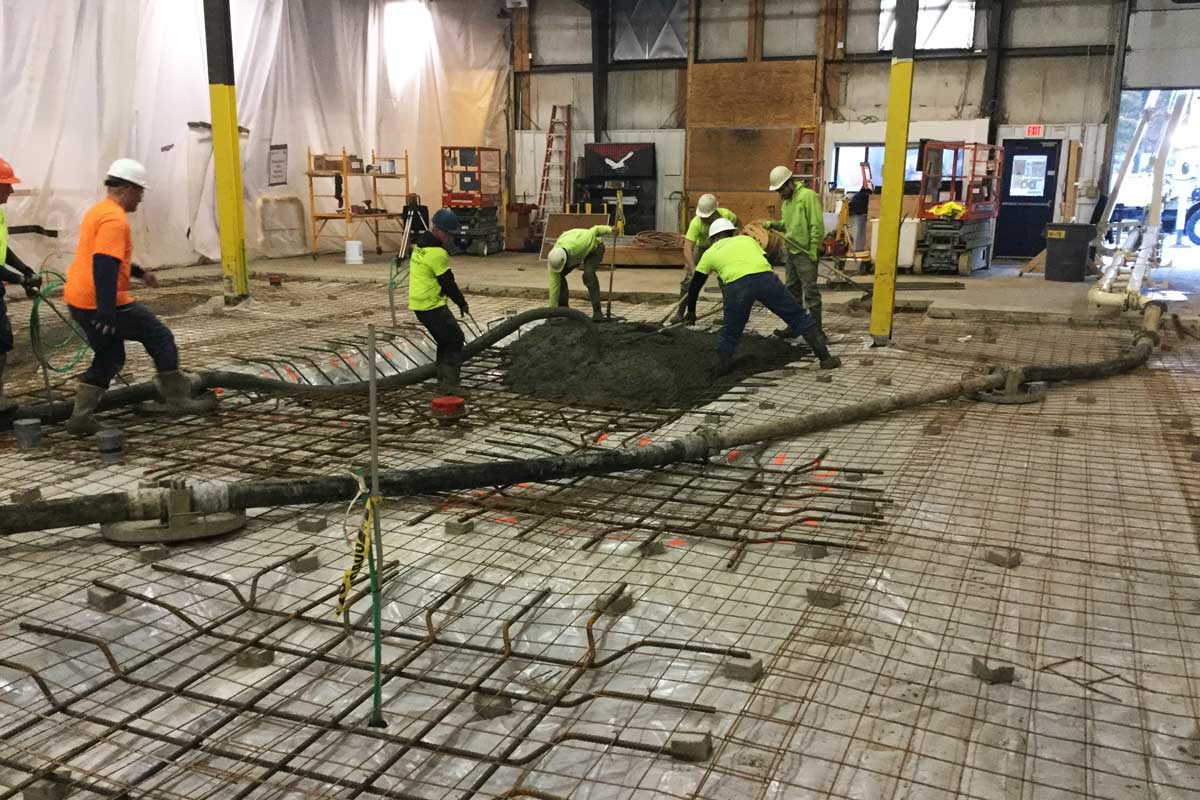 Final placement of concrete floor