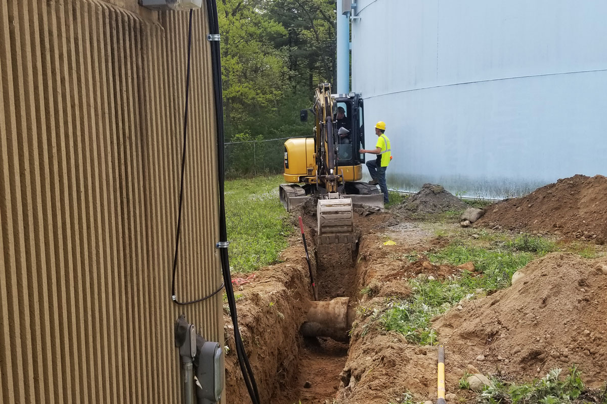 Excavating the trench leading to the Walpole South Tanks