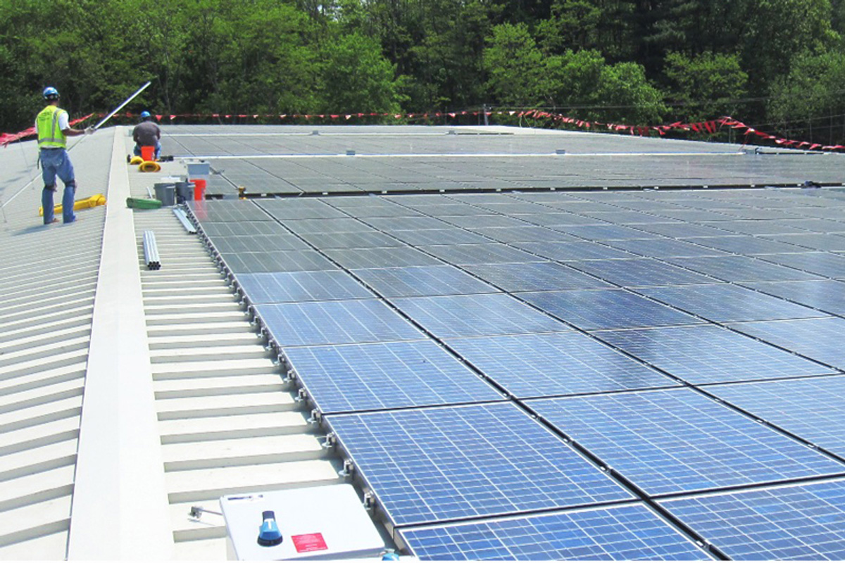 Installing Photovoltaic Modules on the Roof of the Compost Building