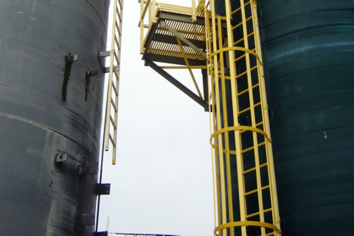 A ladder on the lower portion of the digester