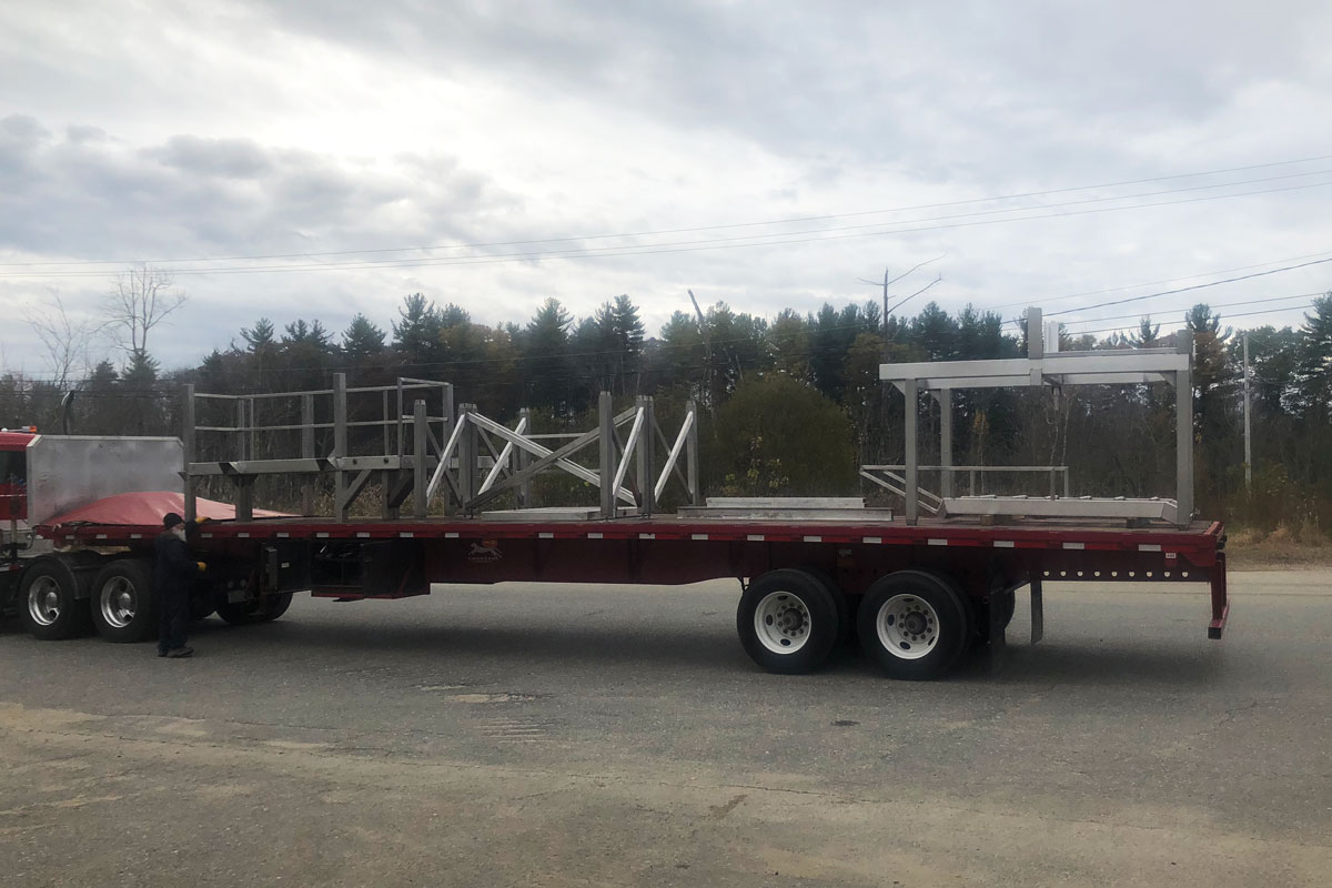 The frame sections loaded on a flatbed ready to be transported to the FoodState facility.