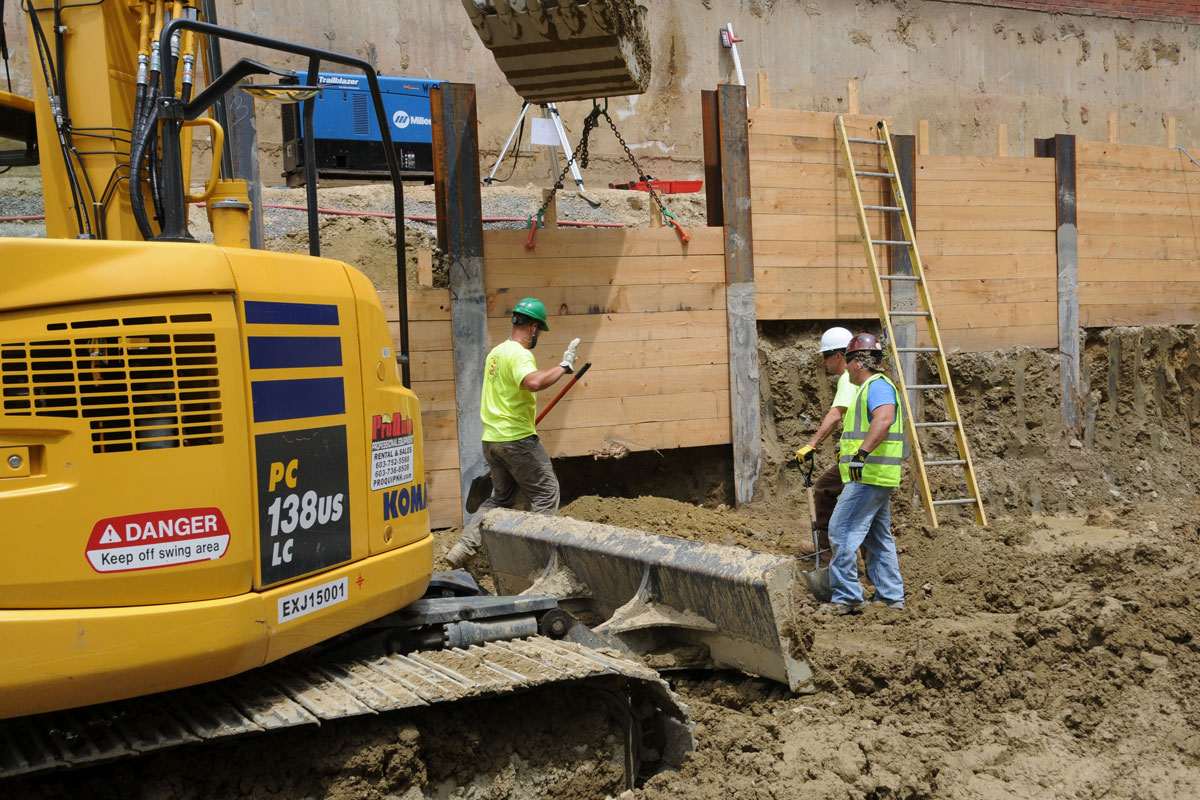 Securing the new construction site with a retaining wall