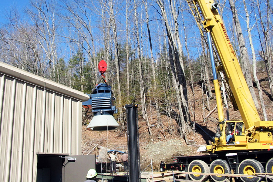 Hoisting the turbine into position at the Glendale Dam